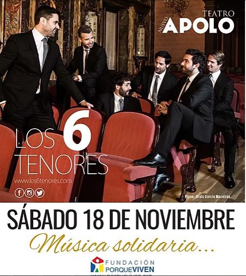 Seis hombres elegantes conversan y sonríen en un teatro. Anuncian un concierto solidario por en Madrid