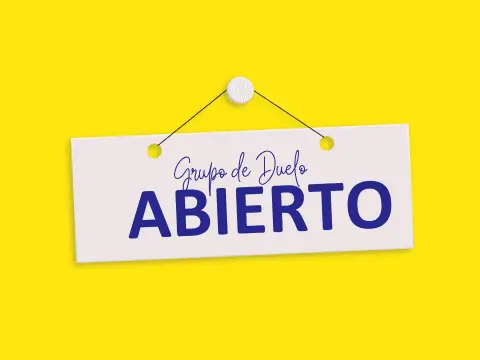 Cartel blanco con "Grupo de Duelo ABIERTO" en azul sobre fondo amarillo, promocionando el apoyo Fundación porqueViven